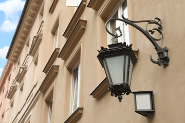 Fototapeta na wymiar Vintage street lamp on wall of building