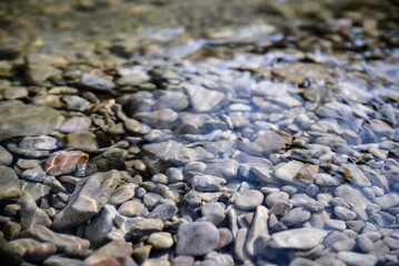 Stones and pebbles on bottom of river