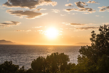 sunset over the sea in Croatia, in the town of Drvenik