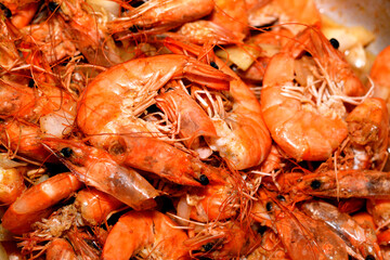 Grey shrimps cooked on hot steam with slices of onion, garlic cumin and salt cooked on hot steam,...