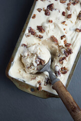 Scooping Homemade Butter Pecan Ice Cream 