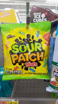 A Package Of Sour Patch Kids Brand Candies Hanging On Display In A Retail Store