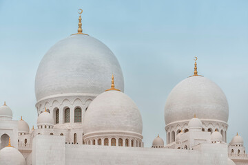 Fototapeta na wymiar A multitude of Domes as part of Abu Dhabi's Sheikh Zayed Mosque 