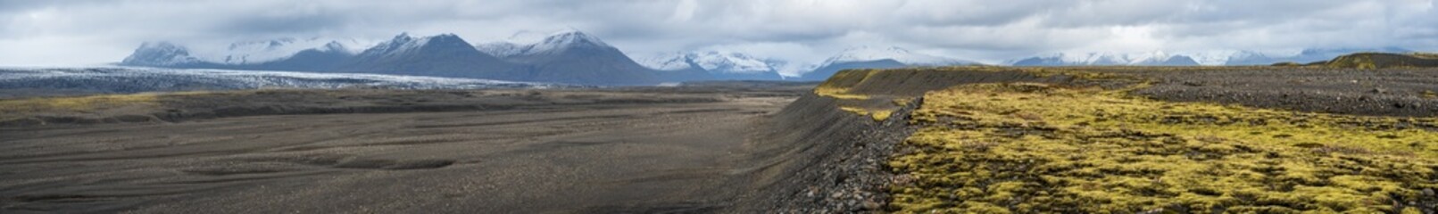 Iceland autumn tundra landscape near Haoldukvisl glacier, Iceland. Glacier tongue slides from the Vatnajokull icecap or Vatna Glacier near subglacial Esjufjoll volcano. Not far from Iceland Ring Road.