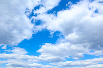 heavenly background. sky. blue sky with fluffy clouds