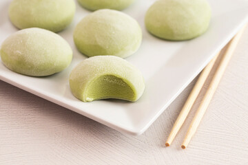 Green Tea Matcha Mochi Ice Cream on a White Kitchen Table