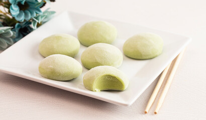 Green Tea Matcha Mochi Ice Cream on a White Kitchen Table