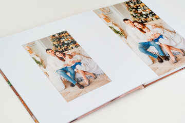 Photobook with photos of family photo shoot.