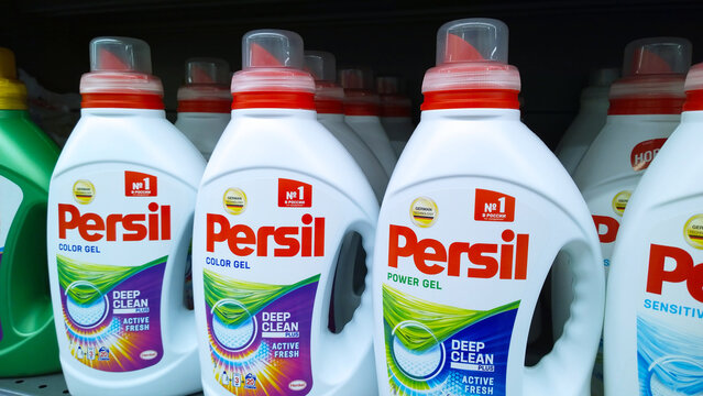 Retail industry. Shelves with washing power and color gel Persil Deep Clean Plus. Household chemistry department. Henkel brand company. Laundry and Home Care. St. Petersburg, Russia - March 31, 2022