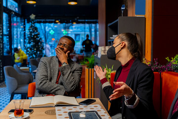 Discussing about the business plans and ideas while sitting