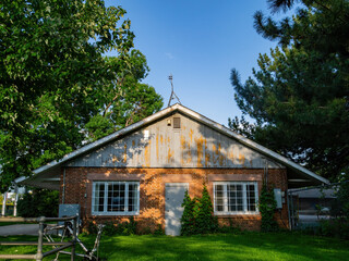 Obraz premium Sunny view of a wooden house