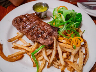 Close up shot of steak and french fries