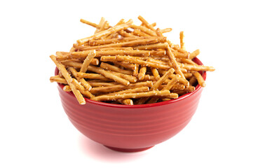 A Bowl of Extra Thin Salted Stick Pretzels Isolated on a White Background