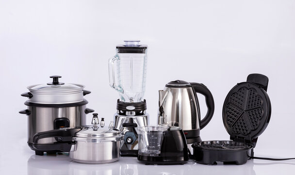 Modern small kitchen appliances on neutral background