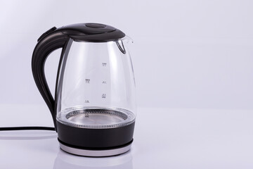 Electric kettle in glass in the kitchen