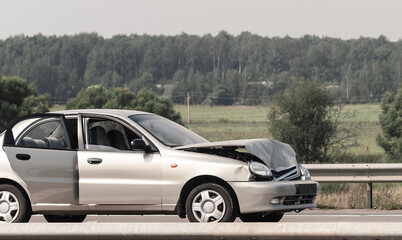 Fototapeta premium crashed new car at highway