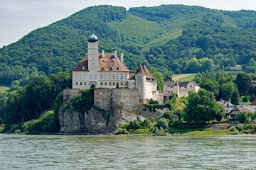 Fototapeta na wymiar A unique hotel on a cliff along the Danube River in Austria