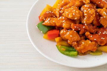 fried crispy chicken with sweet and sour sauce