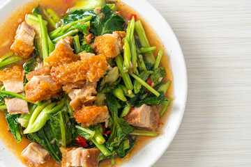 Stir-fried kale vegetable with crispy pork