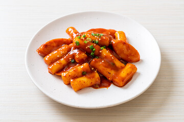 Korean rice cake stick with sausage in spicy sauce - Tteokbokki