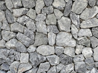 Texture of a stone wall. Old castle stone wall texture background. Stone wall as a background or texture. Part of a stone wall, for background or texture.