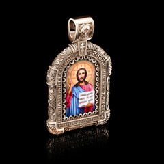 Obraz premium orthodox icon made of gold with the image of Christ on a black background