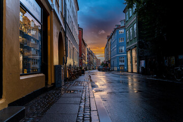 Beautiful sunset on a european narrow street in Copenhagen, Denmark 