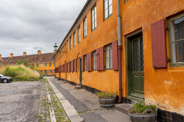 Beautiful view of the Old orange houses in the famous Nyboder district. Copenhagen. Denmark