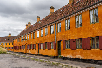 Beautiful view of the Old orange houses in the famous Nyboder district. Copenhagen. Denmark