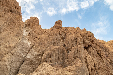 Fototapeta na wymiar Mountains of stone desert near the Tamarim stream on the Israeli side of the Dead Sea near Jerusalem in Israel