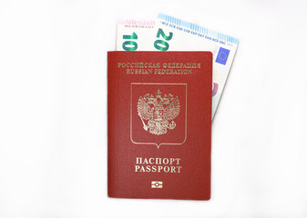 External Passport of Russian Federation on white background. National Russian Passport with European Union currency in. Schengen visa, entry into the European Union. Emigration concept. 
