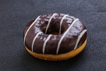 Glazed sweet tasty chocolate donut
