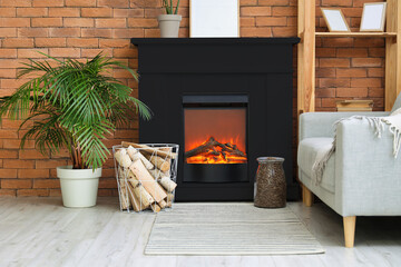 Interior of modern living room with fireplace, houseplant and armchair near brick wall