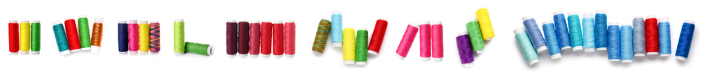 Set of bright sewing threads on white background