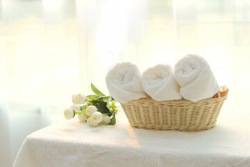 Beautiful spa composition on massage table , spa relax concept, copy space , beautiful spa set on wood table