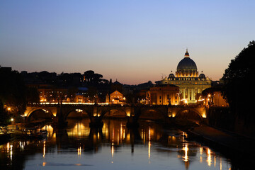 Fototapeta na wymiar Saint Angel Bridge at sunset, Ponte sant'Angelo e San Pietro al tramonto, Rome