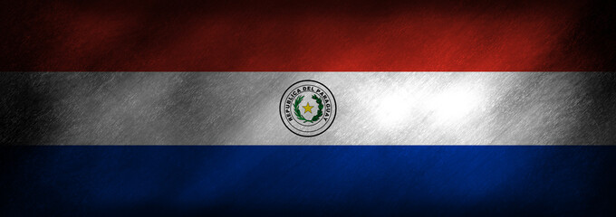 The flag of Paraguay on a retro background