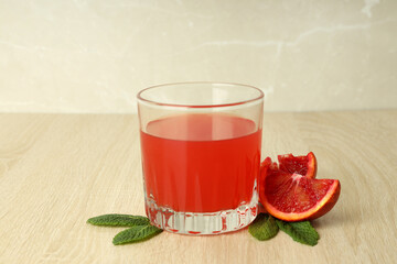Concept of fresh drink with red orange juice, close up