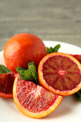 Naklejka na ściany i meble Concept of citrus with red orange, close up