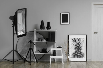 Interior of stylish photo studio with professional equipment