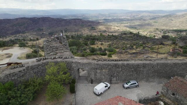 Visitors on the defensive wall of Sortelha, Portugal