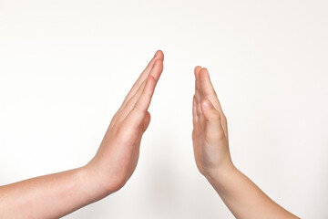Obraz premium a child hand showing a sign on a white background. isolate.
