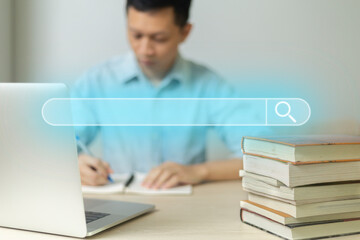Search technology, search engine optimization, man's hand using Laptop computer or smartphone to search information, using search bar function on your website. SEO.