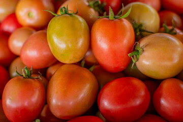 Fresh tomato texture background. Top view. Flat lying.
