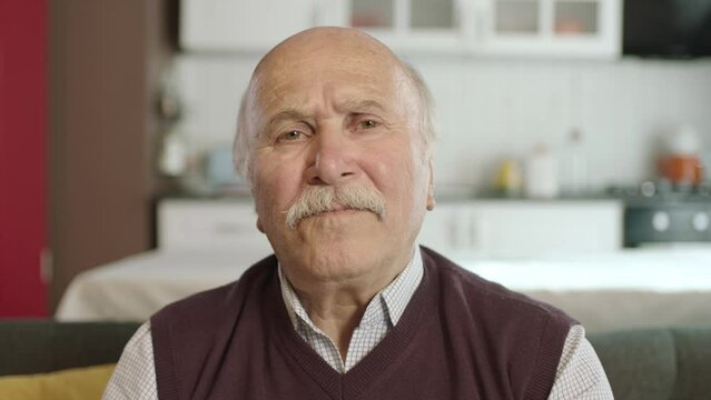 Portrait of human hand showing to camera. Hand kissing.The old man who extends her hand to kiss her visitors during the feast (Ramadan or Şeker Bayram). People who adhere to Muslim traditions.