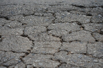 Damaged roads are dangerous for road users.
