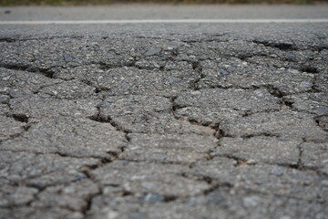 Damaged roads are dangerous for road users.