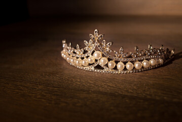 Pearl luxury diadem on wooden background