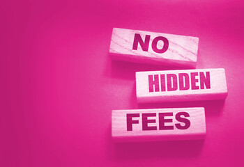 No hidden fees word on wood blocks. Taxes and fees Financial business concept