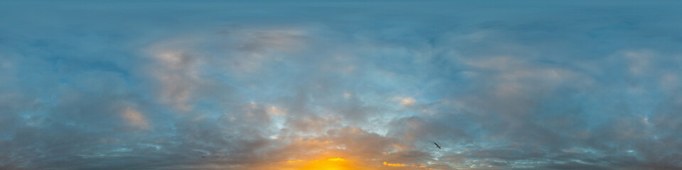 Dramatic sunset sky panorama with Cumulus clouds. Seamless hdr 360 pano in spherical equirectangular format. Complete zenith for 3D visualization, game and sky replacement for aerial drone panoramas